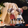 Adorable Couple Miniature Figurines included in the loving Hamper.