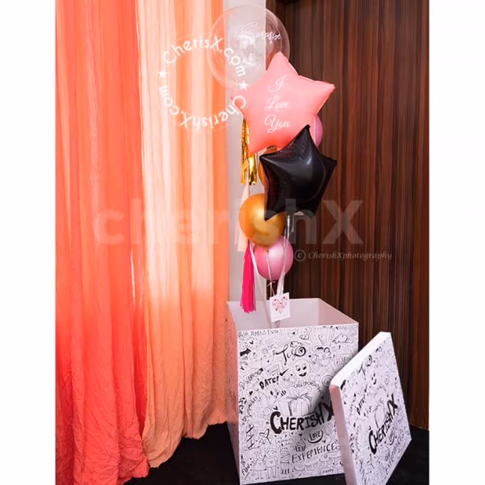 A Helium Filled Bubble Balloon for Valentine's Pastel Pink and Golden Surprise Box.