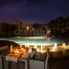 Enjoy the Pool view and the delectable food by booking this Private Poolside Dinner Experience by CherishX!