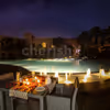 Enjoy the Pool view and the delectable food by booking this Private Poolside Dinner Experience by CherishX!