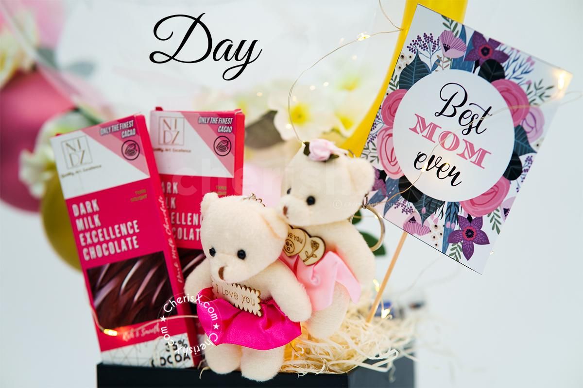 Make the Celebration much more special for your mom with CherishX's Mother's Day Pink Tint Balloon Bucket!