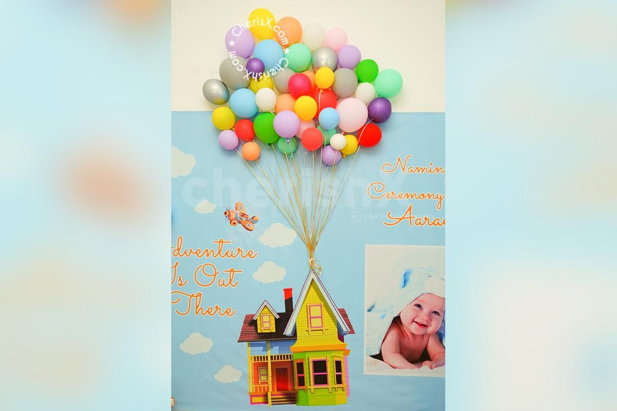 Arrange a beautiful function of naming ceremony with this gorgeous Up Themed Decor by CherishX!