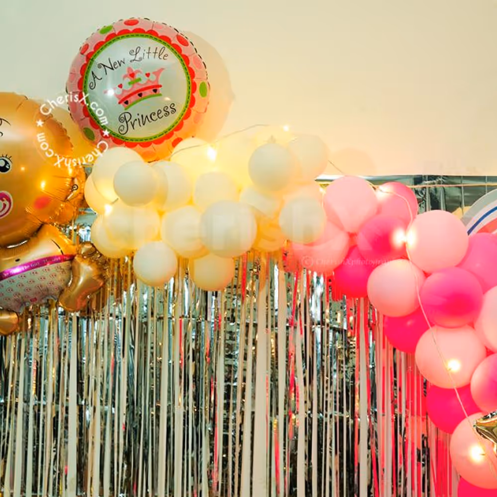 Get this gorgeous Pink balloon decoration for your baby naming ceremony or Annaprashan!