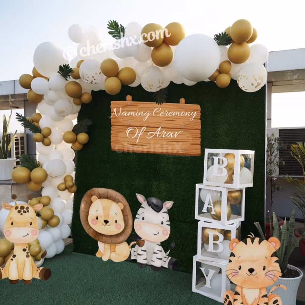 Arrange a perfect naming ceremony decor for your celebrations with CherishX's Jungle Safari Theme Balloon Decor.