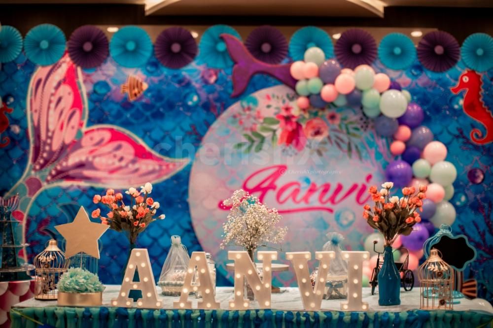 Book a Grand Mermaid Theme Decoration for your kid's birthday, baby shower or welcome baby celebrations.