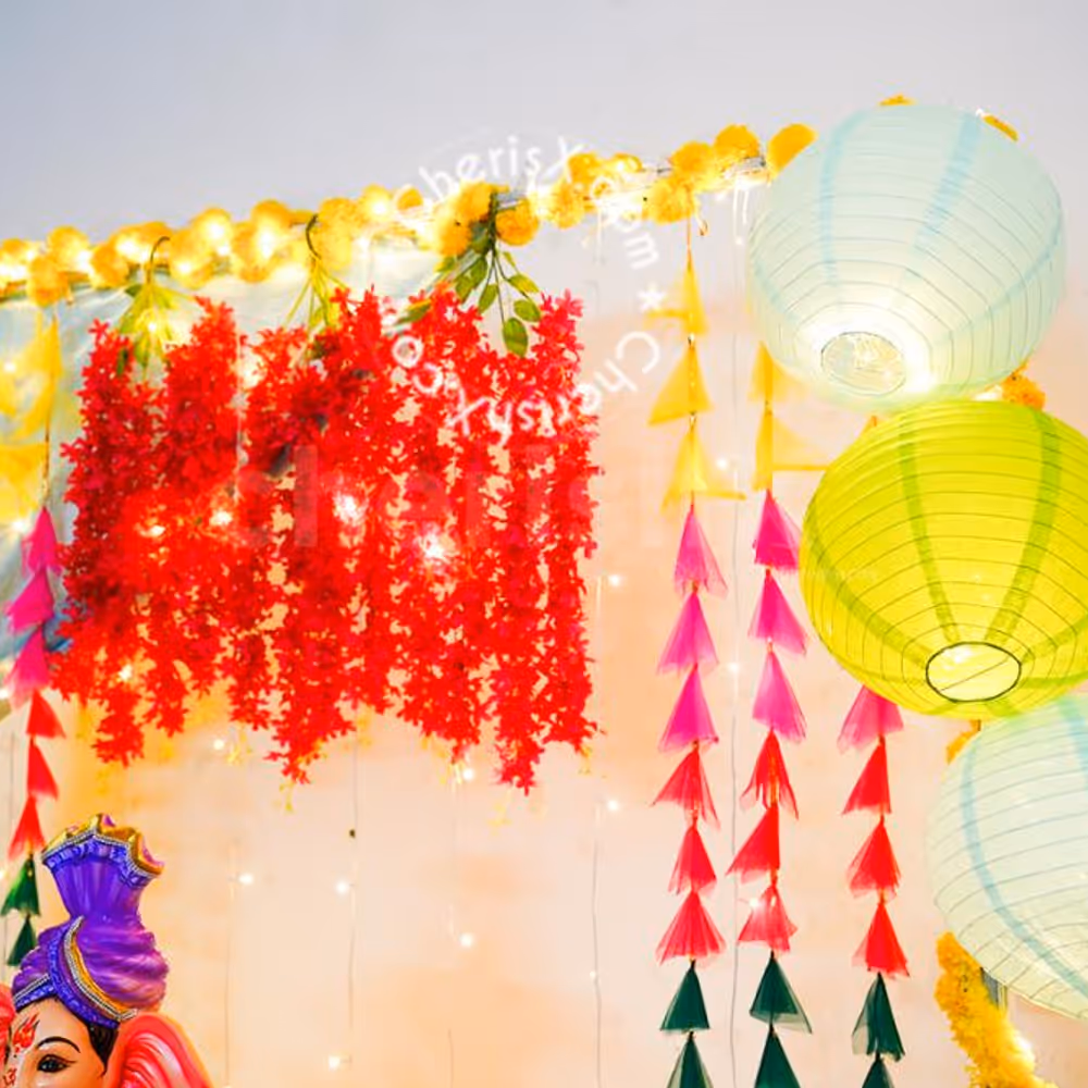 Garlands hanging from the ceiling for decorting the walls of the home for Ganesh Chaturthi!