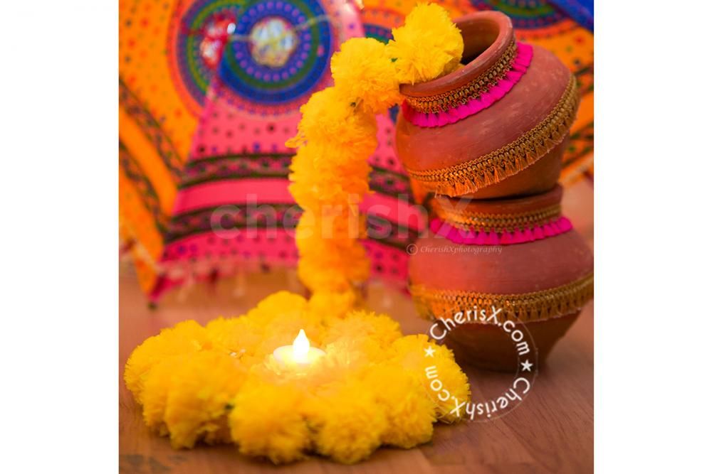 Garlands hanging from the stand for decorting the walls of the home for Ganesh Chaturthi!