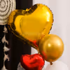 A golden-shaped heart with red balloon foils makes it a classic combination
