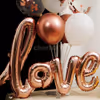 The rose gold balloons add a tinge of extravagance that your special ones will surely love