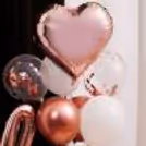 The large rose gold star-shaped balloon foil makes it outstandingly beautiful