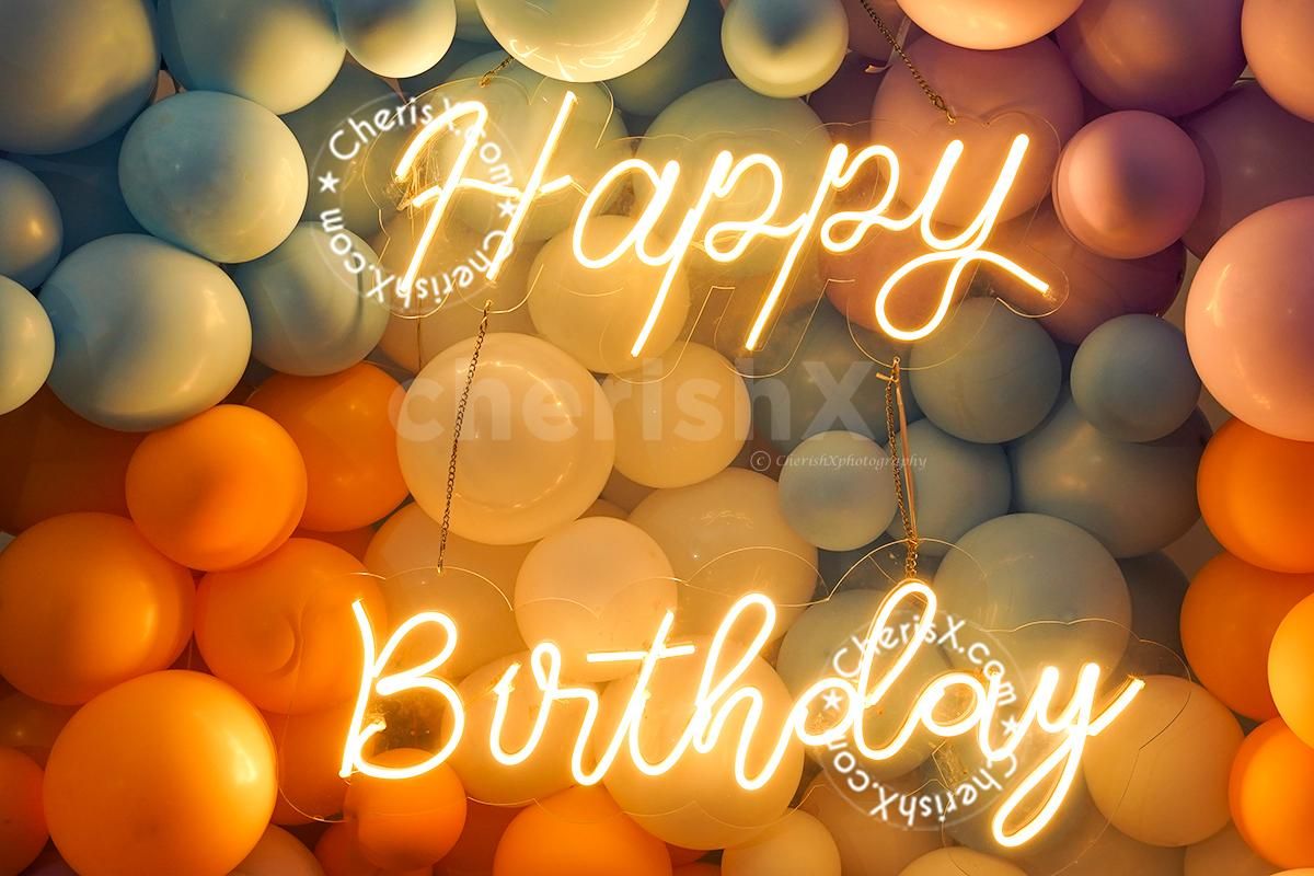 Decorate your entire wall with balloons and add a cake and teddy to make it a complete party kit