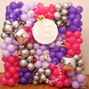 Have an unforgettable housewarming with these special purple and silver balloon decorations.