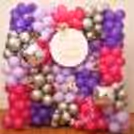 Have an unforgettable housewarming with these special purple and silver balloon decorations.