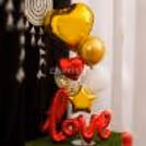 Showcase your love with the most exclusive gift idea of a red and golden love bouquet