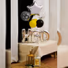A striking silver birthday balloon bouquet will surprise your loved one