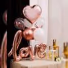 Elegance and classy are the best describing elements of this special rose gold love balloon bouquet