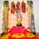 Elegant blush pink floral Janmashtami decoration for a graceful celebration
