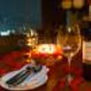 An exceptional open-air dinner with wine and mouth-watering delicacies served as per your choice