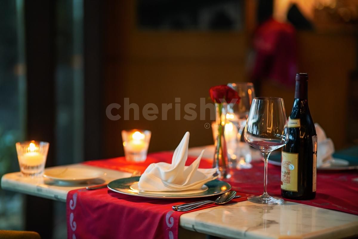 Flowers and candles are the perfect décor combination for an exciting indoor date plan