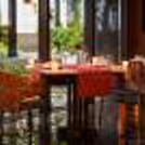 A relaxing evening at Dilli 32 with a brilliant indoor date set up of flowers, candles, meals, and more