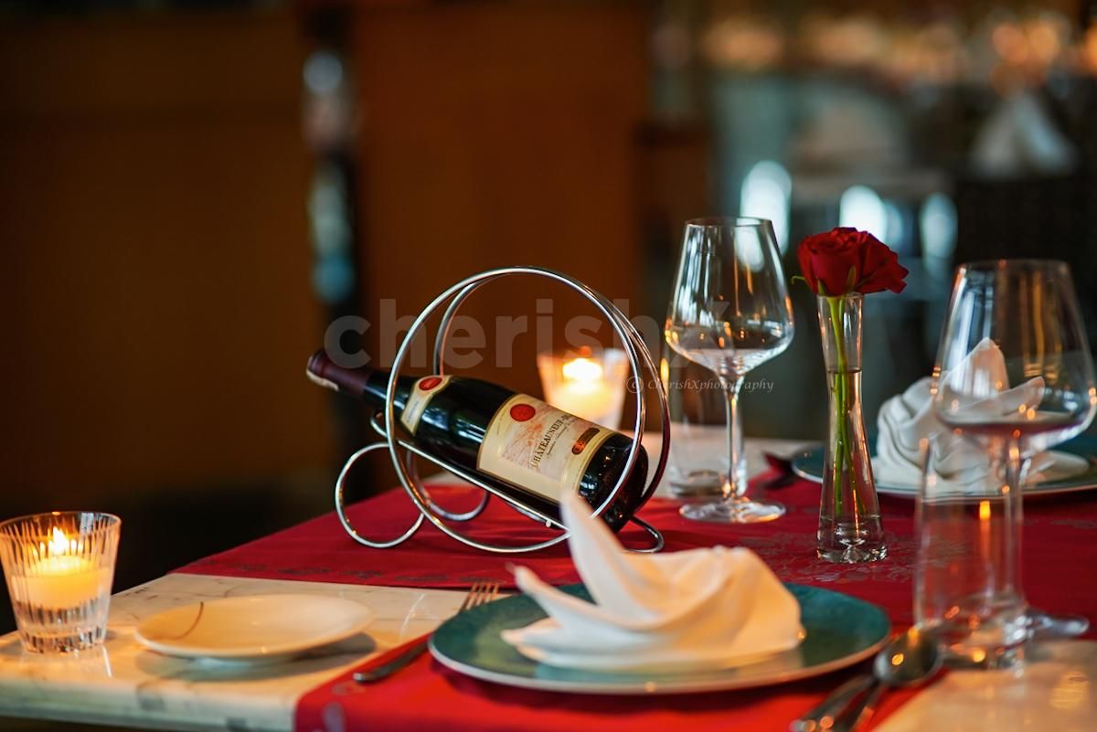 Flowers and candles are the perfect décor combination for an exciting indoor date plan