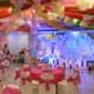 Transform the stage with an illuminated balloon and butterfly haven