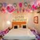 The silver happy birthday foil added with the balloons is an attractive piece of décor