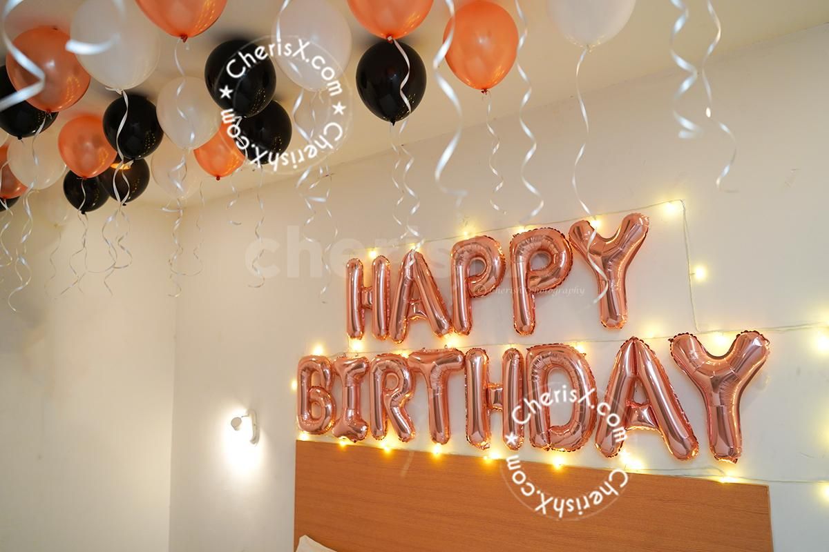 The shimmery rose gold with white and black balloon can be a breath-taking ceiling decor