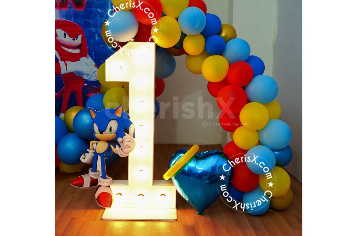 The LED with balloon arch makes it striking on the walls