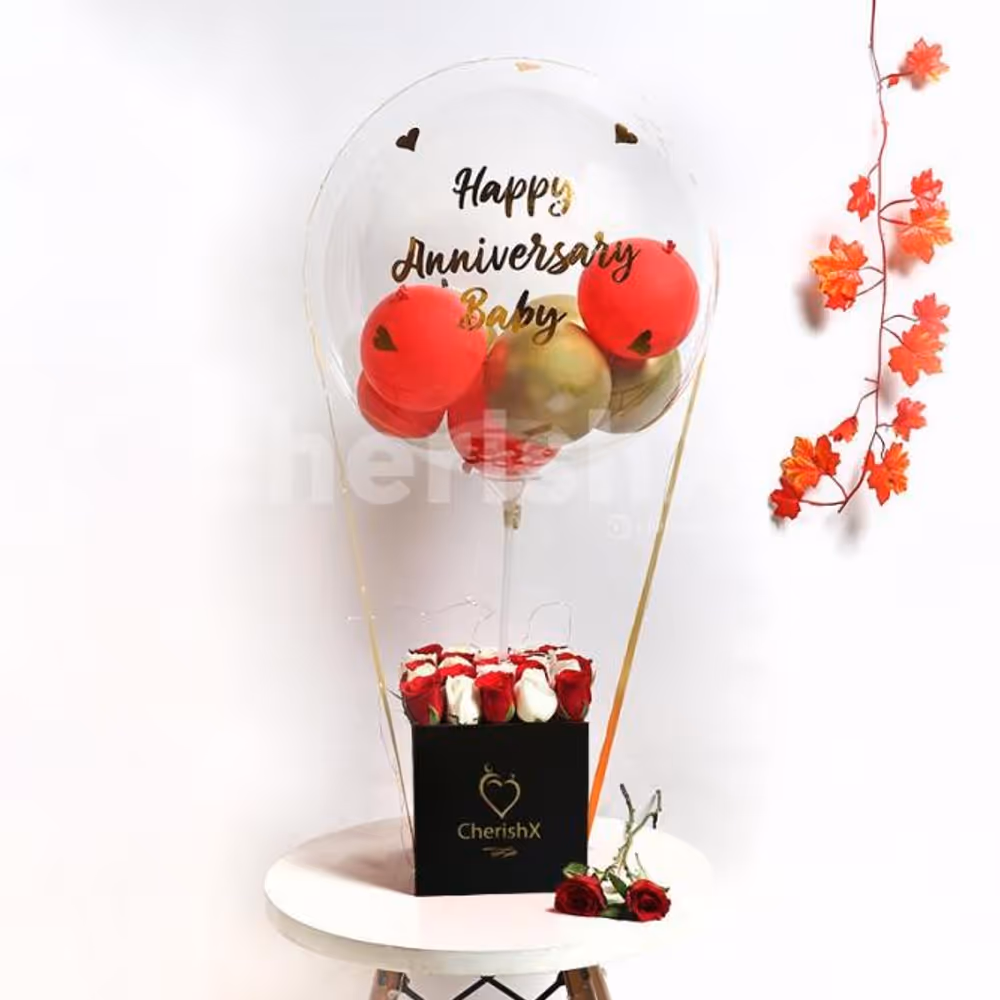 The beautiful looking bucket consists of a gold and red balloons inside one big bubble balloon to give a lovely look!