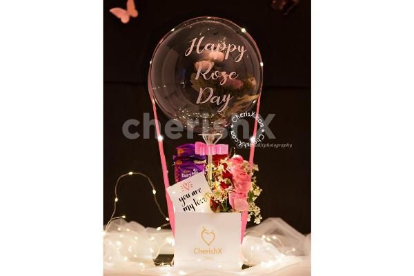 Surprise your partner this Valentine's Day with CherishX's Exclusive Candy Flowers Balloon Bucket Gift!