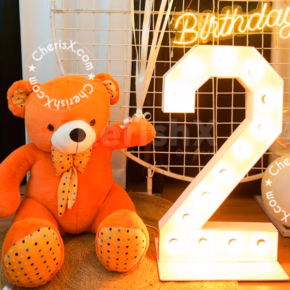A teddy bear photo booth makes for an Instagram-worthy celebration!