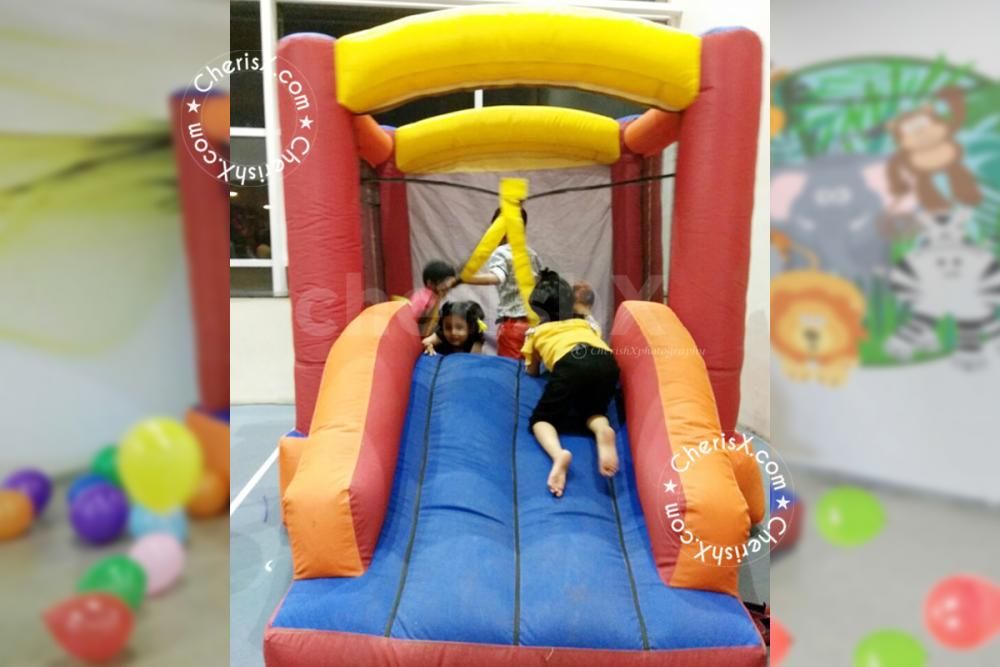 A Jungle Giraffe Bouncy for your Kid's Birthday Party.