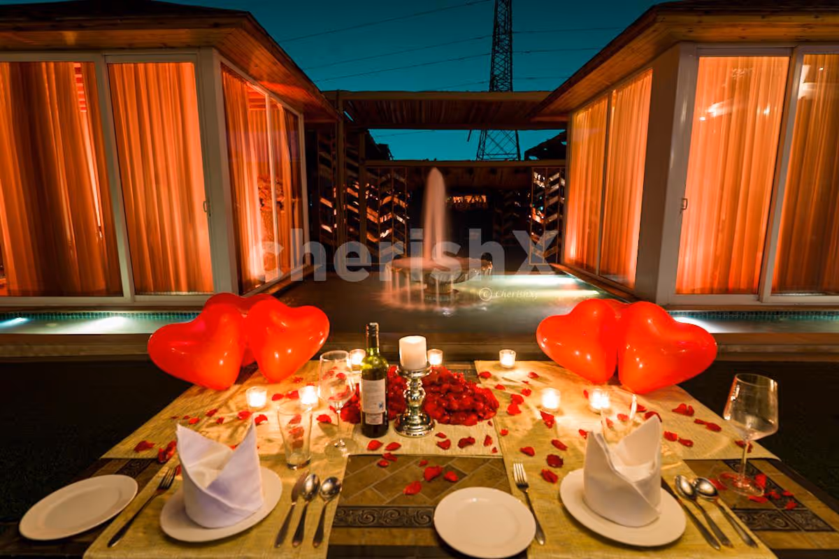 Romantic Karwa Chauth fountain-side candlelight dinner at The Umrao Hotel.