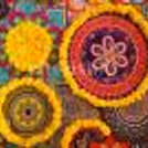 CherishX's Diwali Decoration with 2 pots decorated with 2 yellow Flower Garlands and Green leafs.