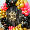 Our black foil frill curtains make for the perfect picture background.