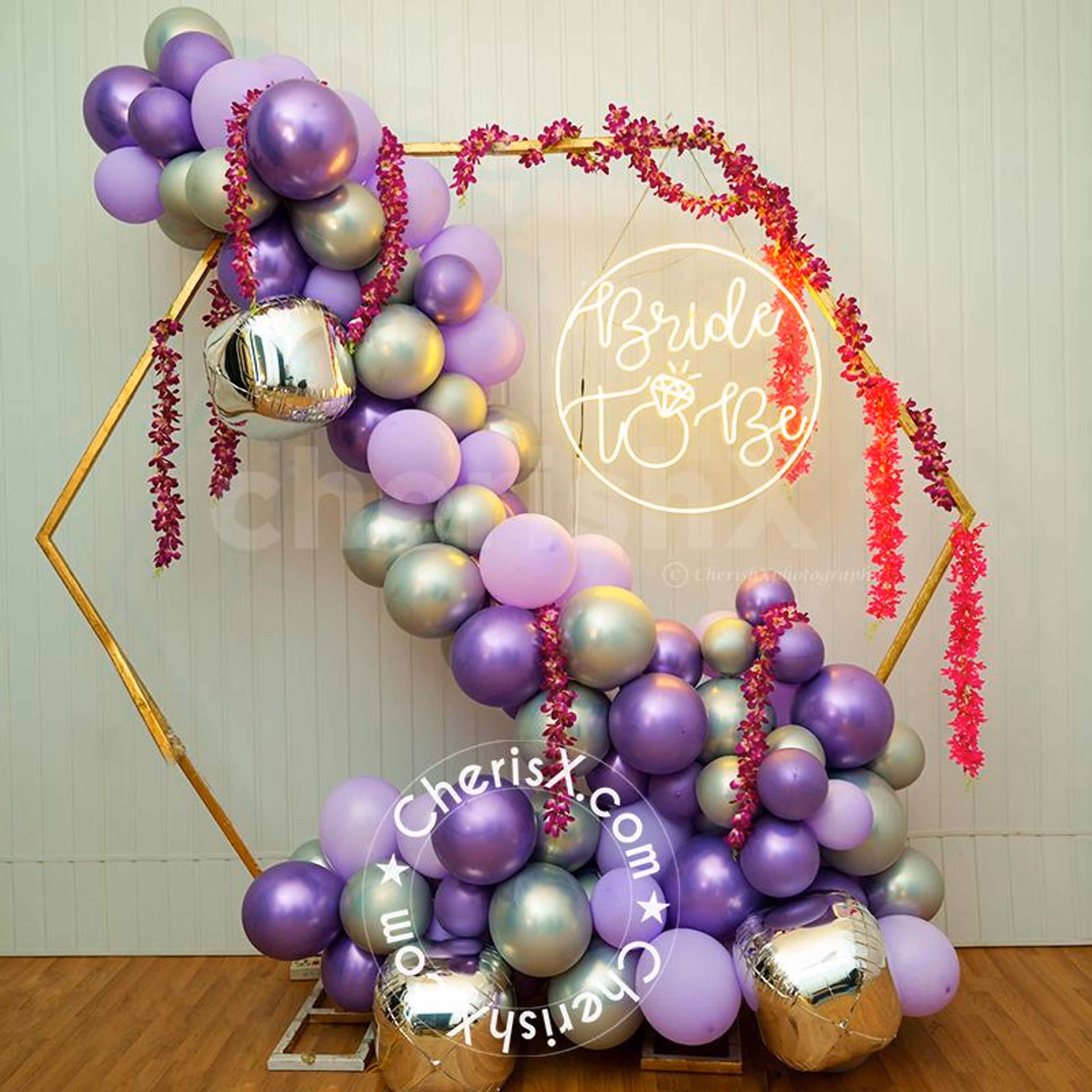 The large arch of colourful balloons makes for the perfect backdrop!