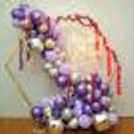 The large arch of colourful balloons makes for the perfect backdrop!
