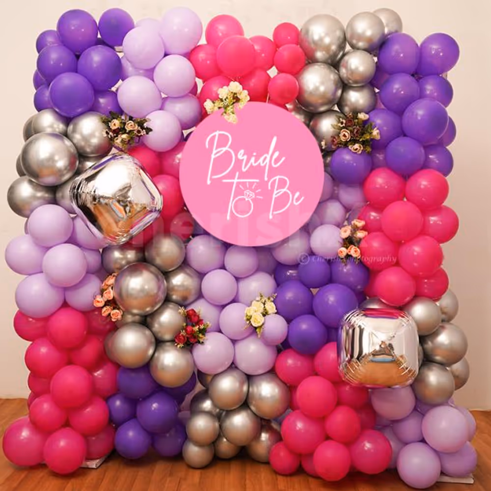 Have an unforgettable bridal shower with these special purple and silver balloon decorations.
