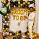 Black and golden bachelorette party decoration with elegant balloon styling
