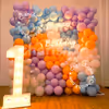 An LED Digit Marquee with pastel balloons and neon signage- imagine the elegance and vibrancy.