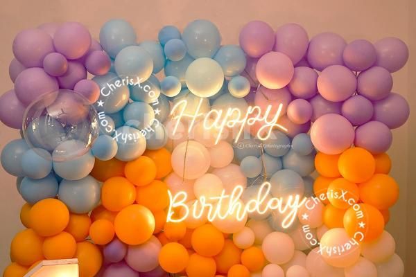 Add a new element of pastel and blue pastel balloons to tour birthday décor