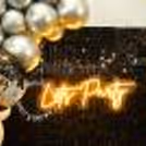 The black sequin backdrop will add brightness to your new year's night