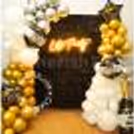 The black sequin backdrop will add brightness to your new year's night