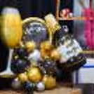 Make your new year party memorable with lights, balloons, flex, and more