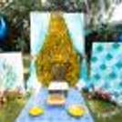 The candle stands on the side making the celebration enlightening