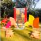 The brass lamps, cushions, and pots make it earthy and eventful