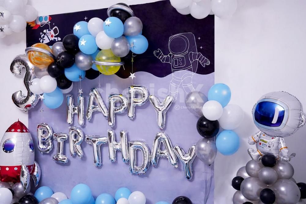 Surprise your kid with this balloons filled Birthday room decor.