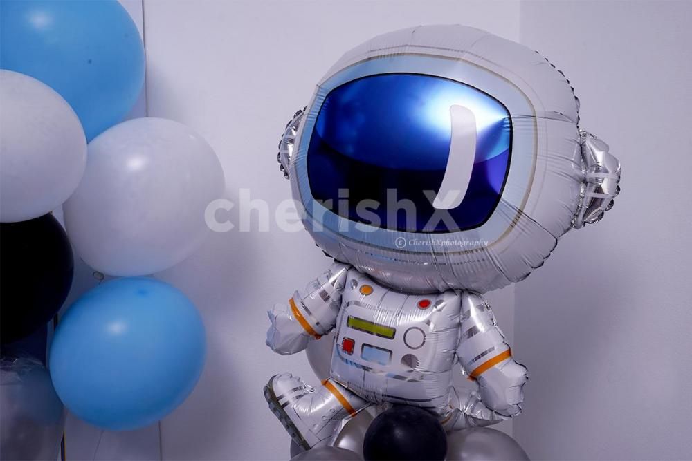 Celebrate your kid's birthday with this adorable Space themed birthday room decor.