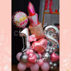 Make it extra festive with a balloon bouquet in pink and silver.